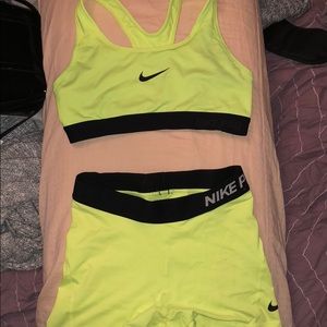 Neon yellow Nike sports bra and Nike pro short set